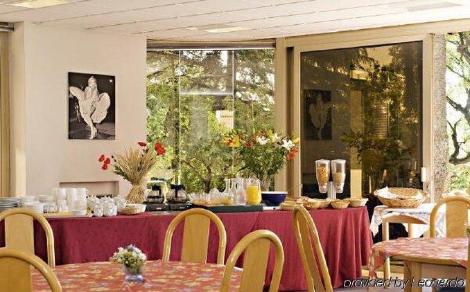 Appartement Les Genevriers à Cannes Restaurant photo